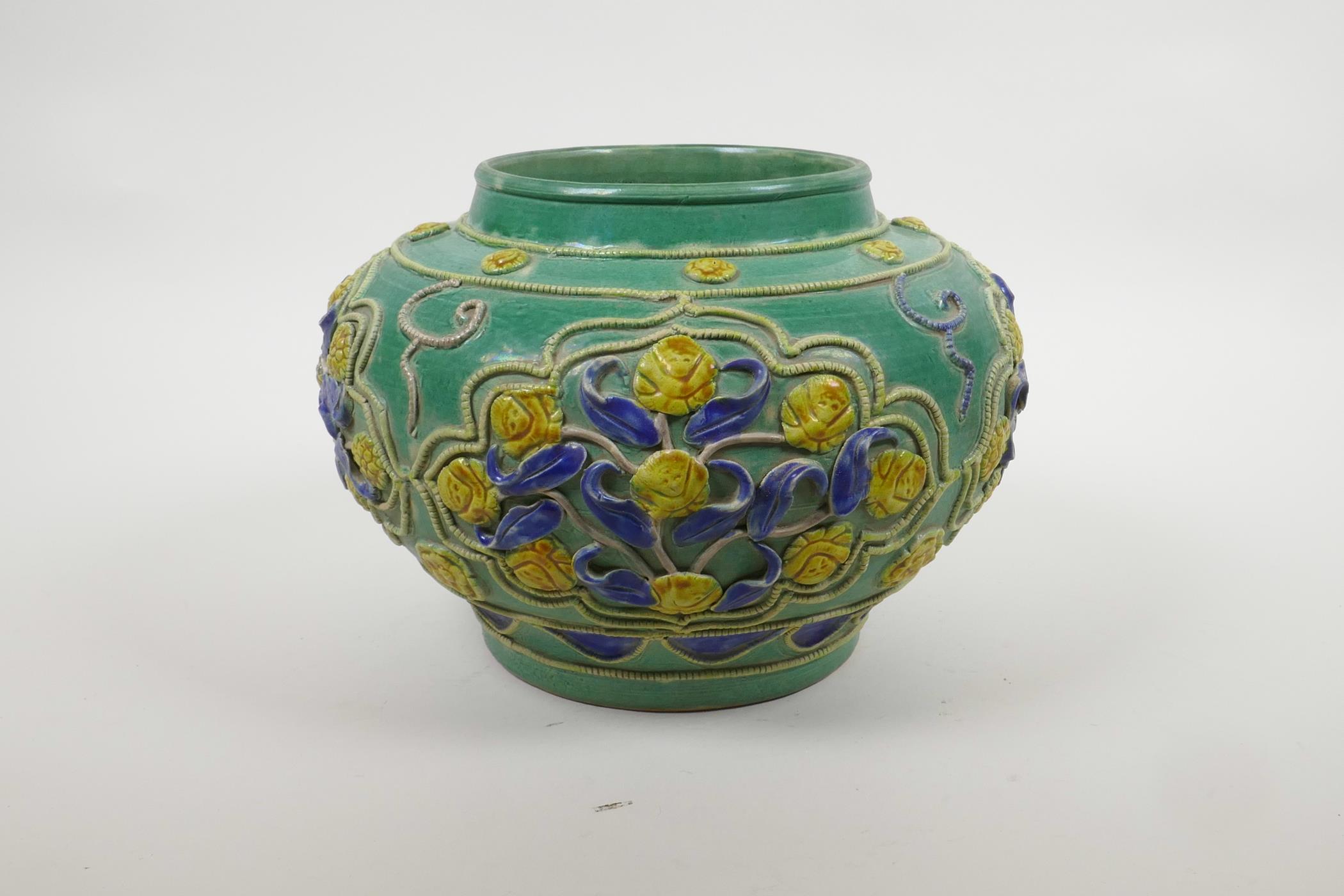 A Chinese green ground pottery vase with raised yellow and blue floral decoration, 9" diameter - Image 2 of 5