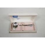 A boxed Dutch silver Christening spoon by Gero Zilvium, the handle decorated with a mother tending a