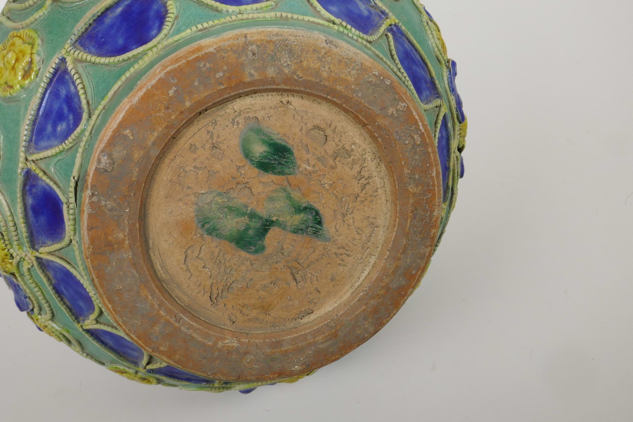A Chinese green ground pottery vase with raised yellow and blue floral decoration, 9" diameter - Image 5 of 5