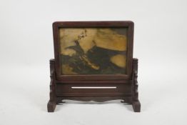 A Chinese reconstituted marbled hardstone table screen with a carved hardwood stand, 9½" x 9"