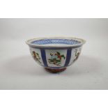 A Chinese Imari style porcelain bowl decorated with gourds and fruit, six character mark to base, 7"