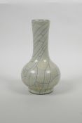 A Chinese crackle glazed pottery bottle vase, 7½" high