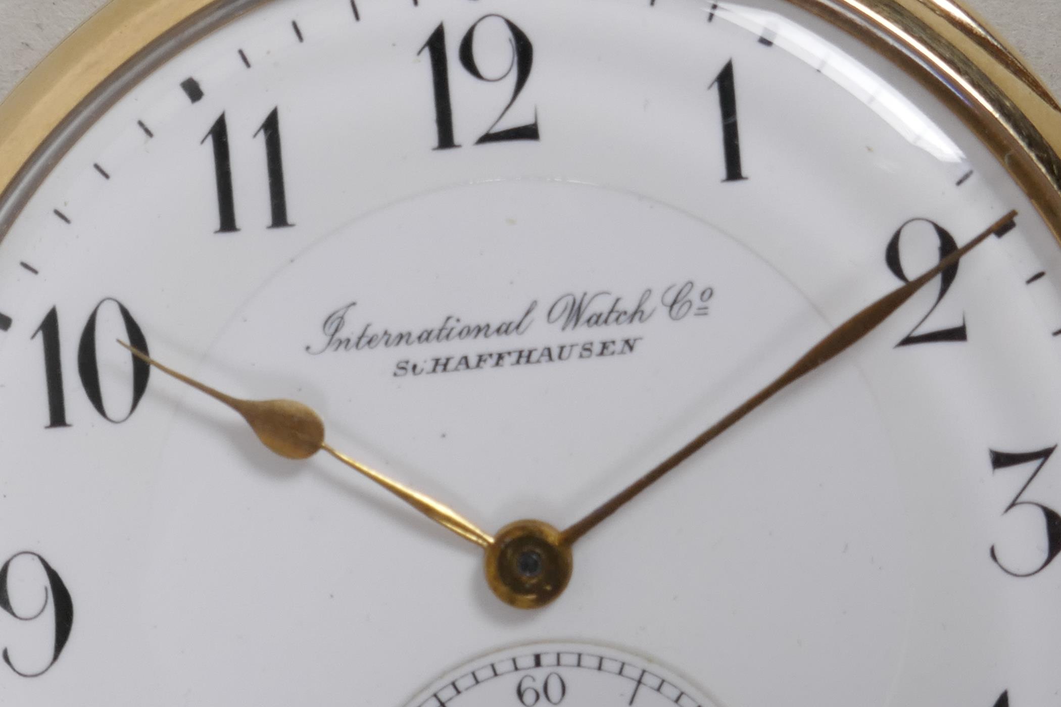 An International Watch Company 14ct gold cased open face pocket watch having white enamel face - Image 2 of 6