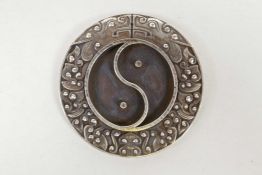 A Chinese white metal Yin Yang brush washer, impressed seal mark verso, 3½" diameter
