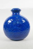 A Chinese blue glazed pottery vase with underglaze dragon decoration, character marks to base, 9½"