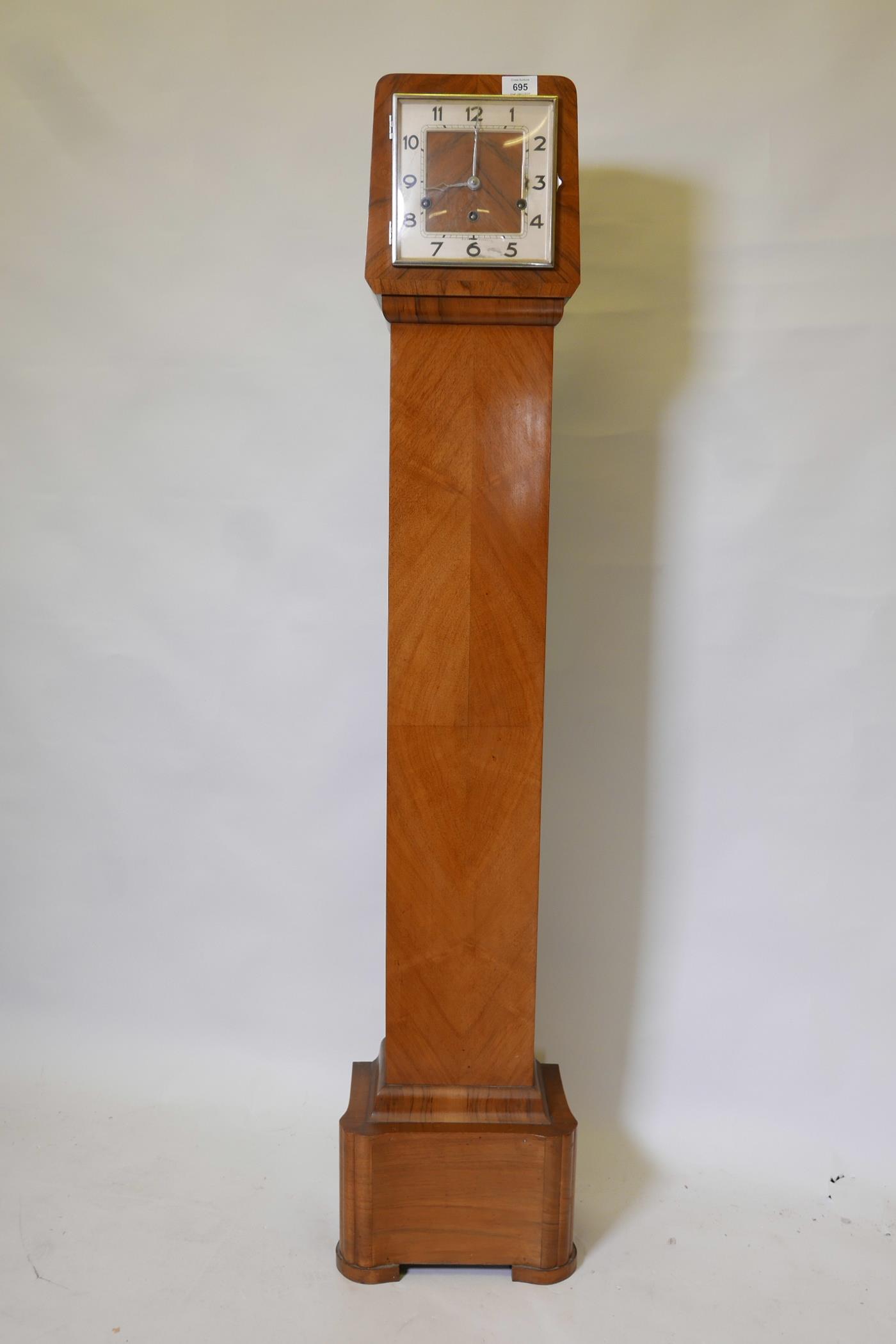 An Art Deco grandmother clock, marked S.D. Neill Belfast, in walnut with square dial and domed