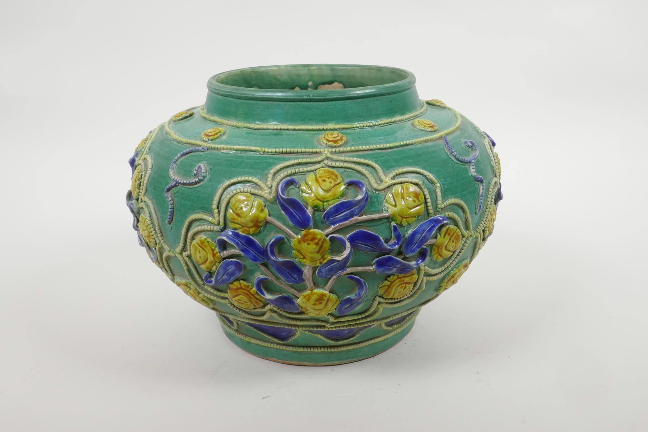 A Chinese green ground pottery vase with raised yellow and blue floral decoration, 9" diameter - Image 4 of 5