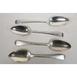 Four Georgian sterling silver serving spoons, by Thomas Wilkes Barker, London, c.1809, all bearing a