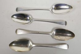 Four Georgian sterling silver serving spoons, by Thomas Wilkes Barker, London, c.1809, all bearing a