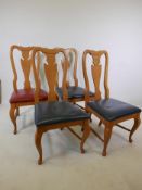 A set of four Queen Anne style oak dining chairs