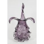 An amethyst studio glass vase with leaf pattern neck and textured body
