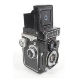A Yashica-E twin lens reflex camera