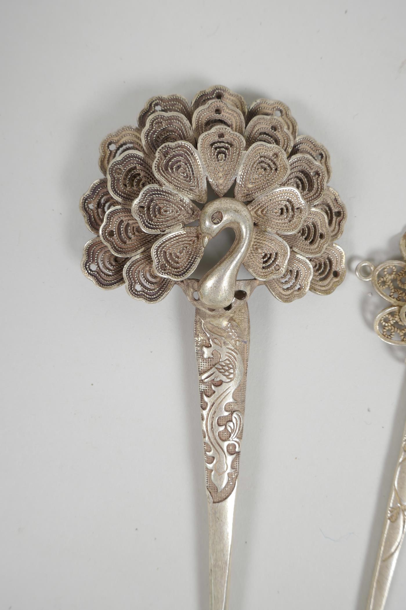 Three Chinese silvered metal hairpins with floral and peacock decoration, impressed character marks, - Image 2 of 7