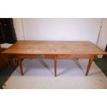 A French style fruitwood farmhouse table, raised on six square tapering supports, 43" x 103" x 29½?