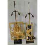 A contemporary gilt metal two light table lamp with applied plaque depicting Quan Yin, 36" high,