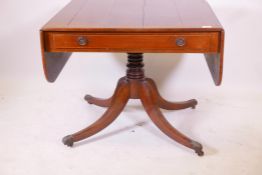 A Regency rosewood single drawer sofa table with satinwood banded top and boxwood stringing,