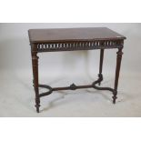 A mahogany centre table, with well carved decoration, pierced frieze and matched veneer top,