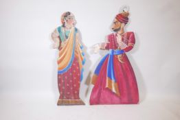 A pair of Indian painted wood figural wall plaques, 47" high