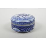 A Chinese blue and white porcelain box and cover with dragon decoration, six character mark to base,