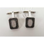 A pair of 925 silver cufflinks encrusted with cubic zirconium and marcasite