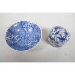 A Chinese, possibly Kangxi blue and white porcelain round box with lid, with flower sprays and a