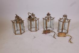 A set of four brass and glass hall lanterns, 11½", A/F