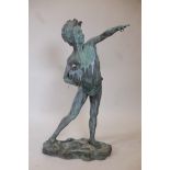A verdigris bronze garden sculpture pf a boy carrying a jug, 44½" high