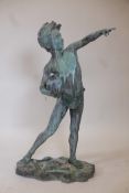 A verdigris bronze garden sculpture pf a boy carrying a jug, 44½" high