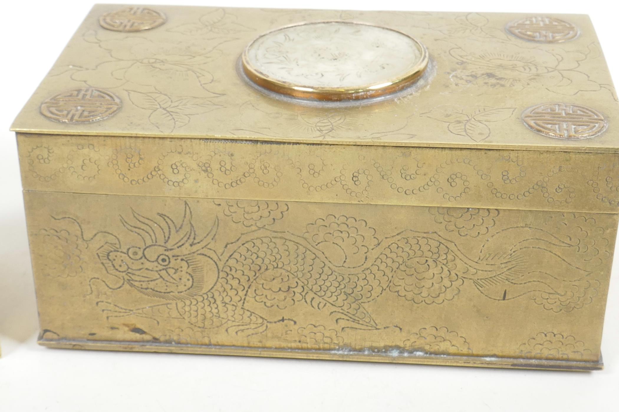 A Chinese brass cased table cigarette box engraved with bats and dragons, and having applied symbols - Image 2 of 5