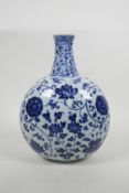 A Chinese blue and white porcelain moon flask with scrolling floral decoration, six character mark