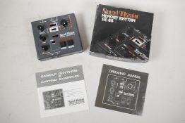 A Soundmaster memory rhythm SR-88 machine, boxed with manual, 7½" x 6½"