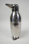 An Art Deco style penguin stainless steel cocktail shaker, 9" high x 3" wide