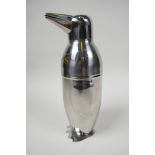 An Art Deco style penguin stainless steel cocktail shaker, 9" high x 3" wide