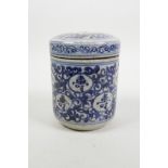 A Chinese blue and white porcelain cylinder pot and cover, with all over auspicious character