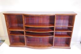 A C19th bow fronted mahogany open bookcase, 78" x 15" x 44"