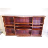 A C19th bow fronted mahogany open bookcase, 78" x 15" x 44"