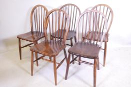 A matched set of five hoop back chairs, some with elm seats