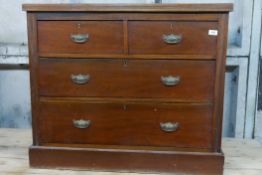 A Victorian walnut chest of two over three drawers, with reeded top and brass handles, raised on a