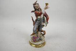 A Continental porcelain figure of a romanticised pirate with a peg leg, standing atop a treasure