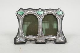 A sterling silver two section Art Nouveau style photo frame