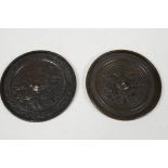 Two small Oriental bronze mirrors with chased and engraved decoration of birds and flowers, 4½"