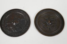 Two small Oriental bronze mirrors with chased and engraved decoration of birds and flowers, 4½"