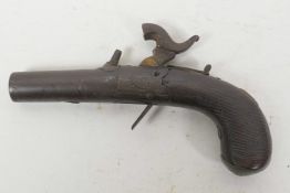 An early C19th Westwood London percussion cap pocket/muff pistol, with folding and sliding safety