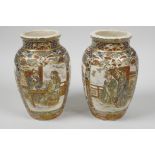 A pair of C19th Satsuma porcelain vases decorated with warriors and figures at a table, one A/F