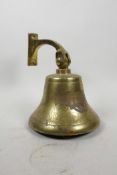 A brass ship's bell, engraved Interfax, 9" drop