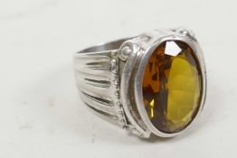 A 925 silver ring set with faceted green (citrine) stone, size 'V'
