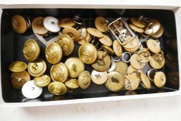 Fifteen brass naval buttons and a quantity of other buttons and buckles