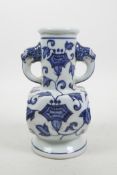 A Chinese blue and white porcelain two handled vase with stylised floral decoration, 6 character