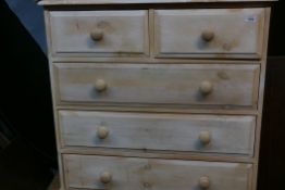 A whitewashed pine chest of two over three moulded drawers, raised on a plinth base, 36" x 16" x 38"