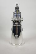 A silver plated cocktail shaker in the form of a lighthouse, 14" long